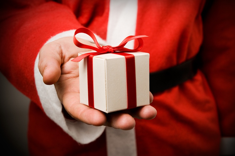 Santa holding gift